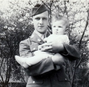 Stanley Murawski home in Albany on furlough in May of 1943. He had a 2 1/2 day train ride from Ephrata Army Air Base in Washington State to get home. Here he meets his niece Theresa-Marie for the first time. She was born after he was called up the previous October. 