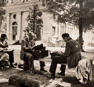 Willim L. Shirer (l. on bench) reporting from France in 1940.